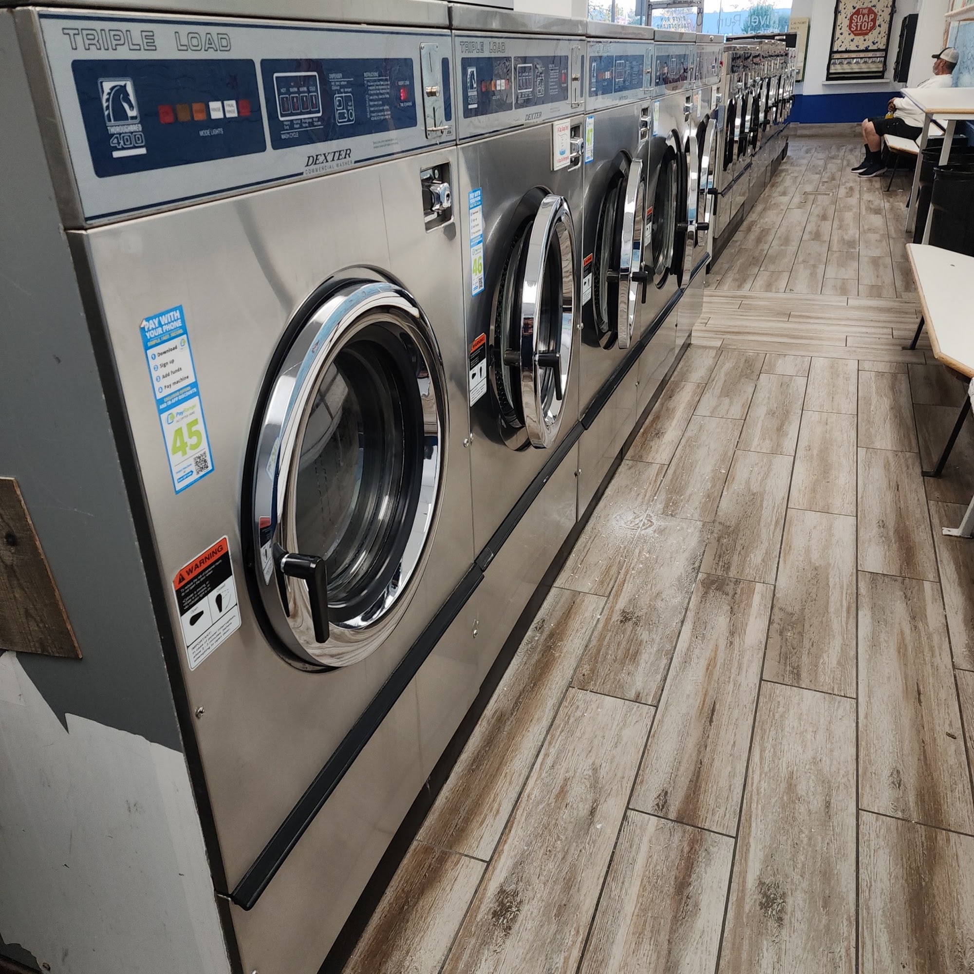 Front-loading washing machines at River Run Laundry