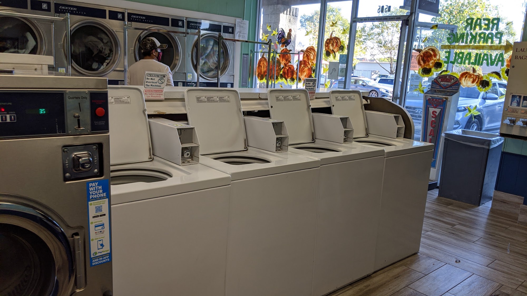 Washing machines and dryers inside River Run Laundry